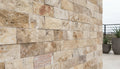 Close-up of Autumn Leaves Scabos Travertine Split Face 2 x 4 Mosaic, in Autumn tones.