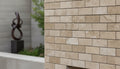 Close-up of Silver Travertine Wavy 2 x 4 Mosaic, in Silver tones.