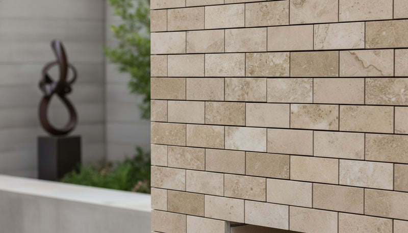 Close-up of Silver Travertine Wavy 2 x 4 Mosaic, in Silver tones.