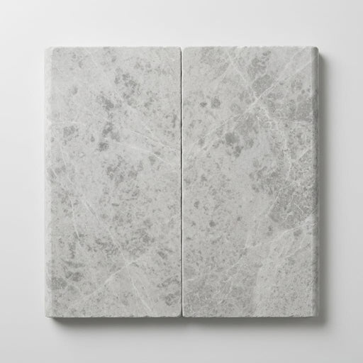 Marine Fantasy 12x24 Tumbled Marble Single Bullnose Pool Coping close-up