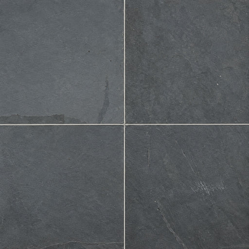Four Montauk Blue natural stone pavers with dark blue-gray surfaces.