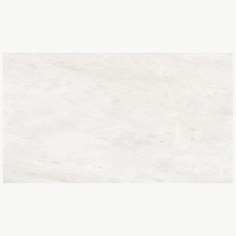 Namib Bianco 2cm polished marble slab with a soft white surface and subtle pale gray and cream veining.