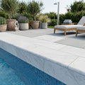 Natural Carrara Equinox Marble Leather (Sandblasted & Brushed) 12 x 24 x 2 Double Bullnose Coping 12x24 pool coping — Swimming Pool remodel pool edge