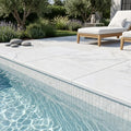 Natural Carrara Equinox Marble Leather (Sandblasted & Brushed) 16 x 24 x 1.25 Bullnose Coping 16x24 pool coping — Swimming Pool pool edge drop-face coping