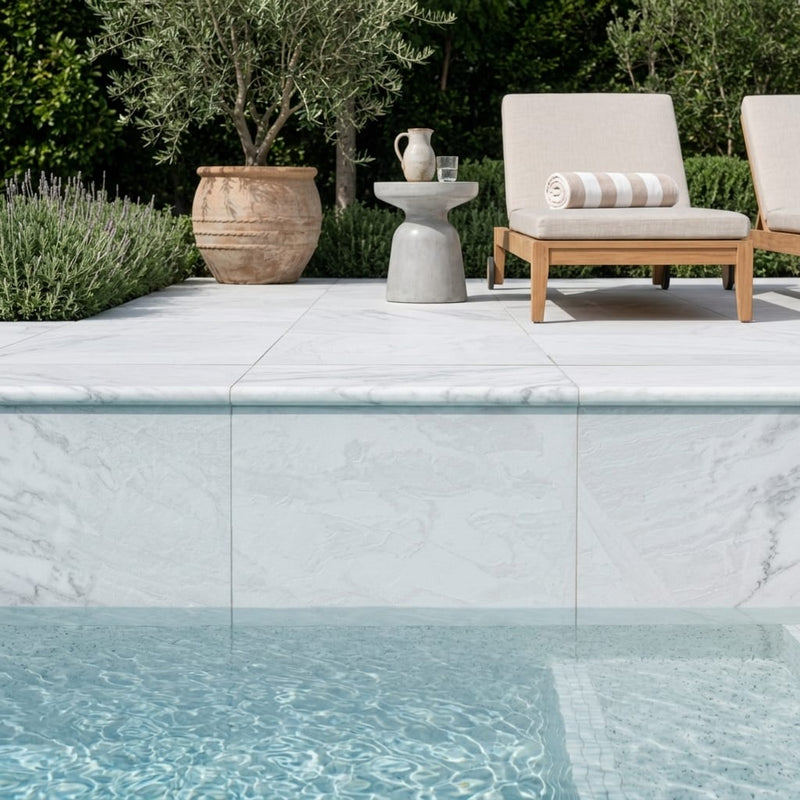 Natural Carrara Equinox Marble Leather (Sandblasted & Brushed) 16 x 24 x 1.25 Bullnose Coping 16x24 pool coping — Swimming Pool remodel pool edge