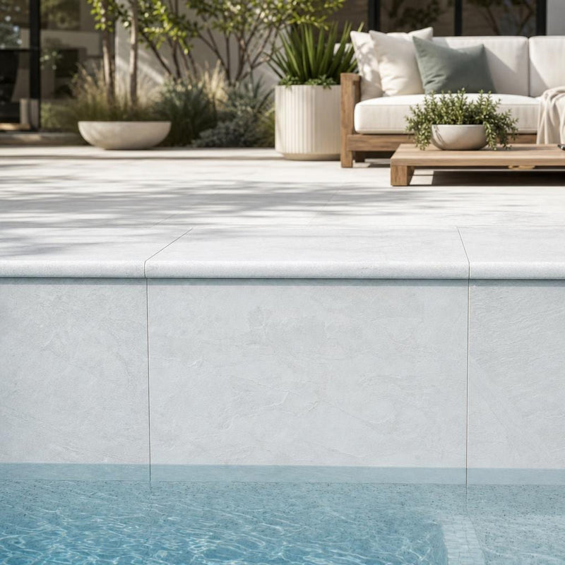 Natural Carrara Equinox Marble Leather (Sandblasted & Brushed) 16 x 24 x 2 Double Bullnose Coping 16x24 pool coping — Swimming Pool remodel pool edge