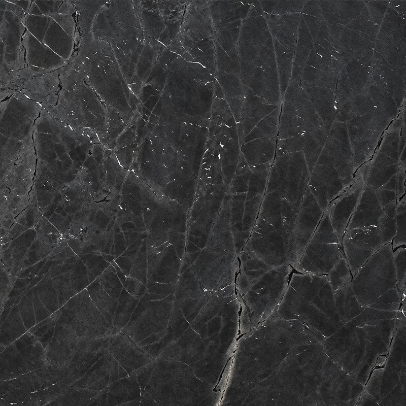 Negresco dark charcoal granite slab with fine pale veining and a honed leathered surface.