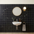 Nero Marquina (Black) Marble 2x2 Honed Mosaic — Powder Room wall