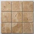 Beige Noce Travertine Coping 12x12 Tumbled Bullnose 1.25 inch close-up