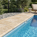 Beige Noce Travertine Coping 12x12 Tumbled Bullnose 1.25 inch pool coping — Swimming Pool pool edge drop-face coping