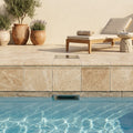 Beige Noce Travertine Coping 12x12 Tumbled Bullnose 1.25 inch pool coping — Swimming Pool remodel pool edge