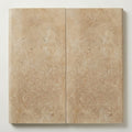 Beige Noce Travertine Coping 12x24 Filled Honed Bullnose 2 inch close-up