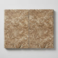 Noce Travertine Coping 16x24 Tumbled Bullnose 2 inch close-up