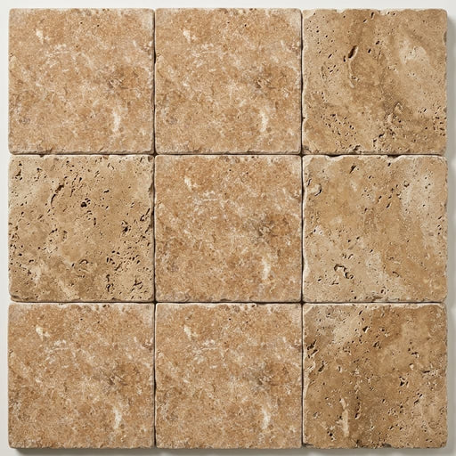 Noce Travertine Paver 12x12 Unfilled Chiseled 1.25 inch close-up