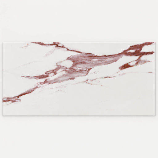 Single Nusa 23.6x47.2 satin porcelain tile with an off-white background and reddish-brown marble-look veining.