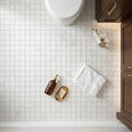 Oriental White (Asian Statuary) Marble 2x2 Honed Mosaic — Bathroom floor