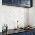 Oriental White (Asian Statuary) Marble 3x6 Tumbled Tile — Wet Bar backsplash