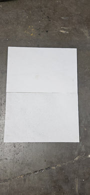 Close-up of White Marble Leather (Sandblasted & Brushed) 12 x 24 x 1.25 Paver, in White tones.