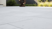 Close-up of White Marble Leather (Sandblasted & Brushed) French Versailles x 1.25 Paver, in White tones.