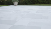 Close-up of White Marble Leather (Sandblasted & Brushed) Roman x 1.25 Paver, in White tones.