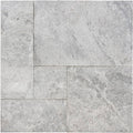 Close-up of Tundra Marble Leather (Sandblasted & Brushed) French Versailles x 1.25 Paver, in Tundra tones.