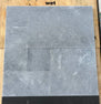 Close-up of Blue Island Marble Leather (Sandblasted & Brushed) French Versailles x 1.25 Paver, in Blue Island tones.