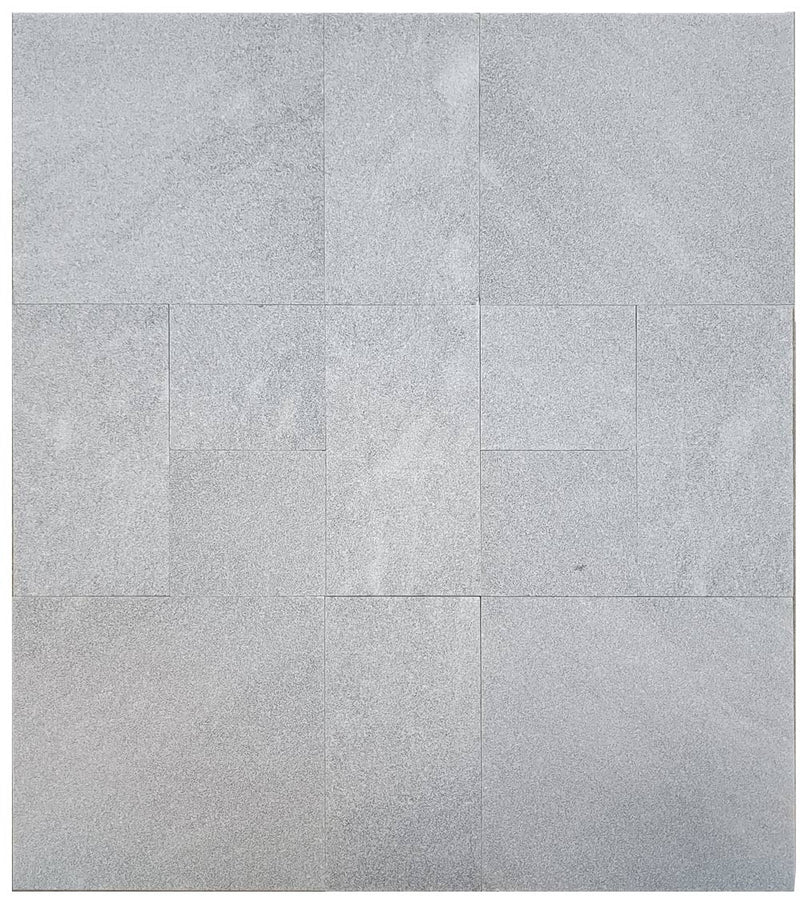 Close-up of Blue Island Marble Leather (Sandblasted & Brushed) Roman x 1.25 Paver, in Blue Island tones.