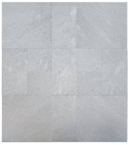 Close-up of Blue Island Marble Leather (Sandblasted & Brushed) Roman x 1.25 Paver, in Blue Island tones.