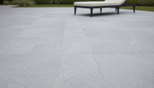 Close-up of Blue Island Marble Leather (Sandblasted & Brushed) Roman x 1.25 Paver, in Blue Island tones.