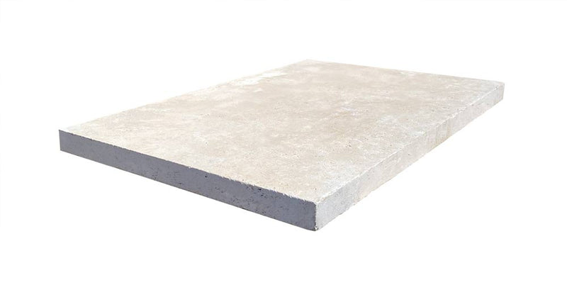 Close-up of Ivory Cordoba Cream Travertine Tumbled 16 x 24 x 1.25 Paver, in Ivory tones.