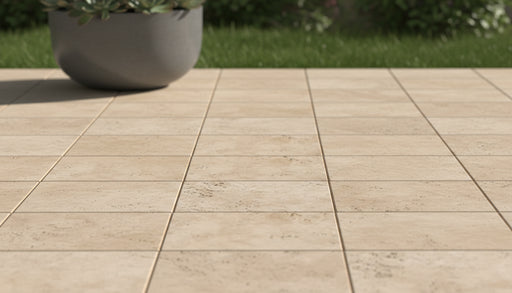 Close-up of Chocolate Brown Walnut Travertine Tumbled 12 x 12 x 1.25 Paver, in Brown tones.