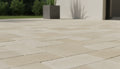 Close-up of Chocolate Brown Walnut Travertine Tumbled 6 x 12 x 1.25 Paver, in Brown tones.