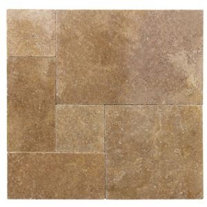 Close-up of Noce Travertine Tumbled French Versailles x 1.25 Paver, in Noce tones.