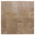 Close-up of Noce Travertine Tumbled French Versailles x 1.25 Paver, in Noce tones.