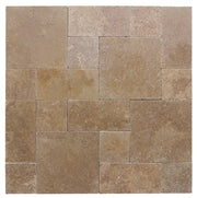 Close-up of Noce Travertine Tumbled French Versailles x 1.25 Paver, in Noce tones.