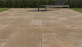 Close-up of Noce Travertine Tumbled Roman x 1.25 Paver, in Noce tones.