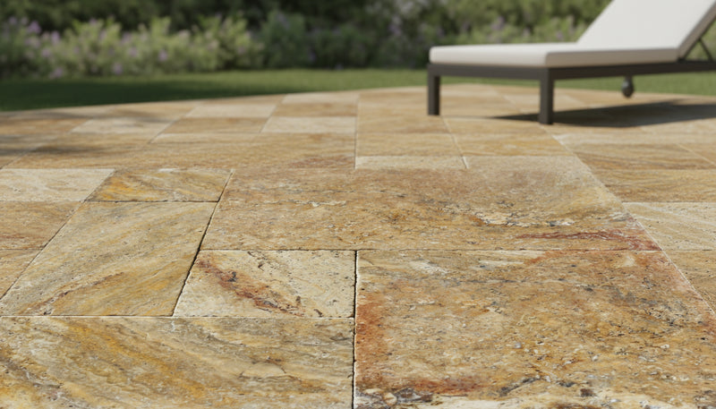 Close-up of Autumn Leaves Scabos Travertine Tumbled French Versailles x 1.25 Paver, in Autumn tones.