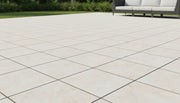 Close-up of Desert Sand Limestone Tumbled 12 x 12 x 1.25 Paver, in Desert Sand tones.