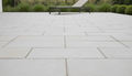 Close-up of Desert Sand Limestone Tumbled 12 x 24 x 1.25 Paver, in Desert Sand tones.