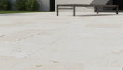Close-up of Desert Sand Limestone Tumbled French Versailles x 1.25 Paver, in Desert Sand tones.
