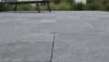 Close-up of Natural Indian Bluestone Limestone Tumbled French Versailles x 1.25 Paver, in Natural tones.