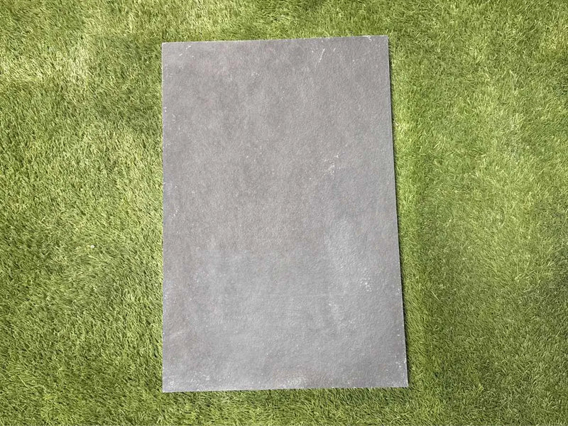 Close-up of Indian Black Limestone Tumbled 16 x 24 x 1.25 Paver, in Black tones.