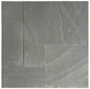 Close-up of Natural Aqua Dolce Sandstone Flamed French Versailles x 1.25 Paver, in Natural tones.