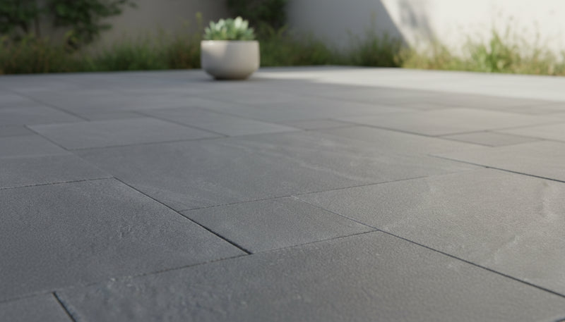 Close-up of Natural Aqua Dolce Sandstone Flamed French Versailles x 1.25 Paver, in Natural tones.