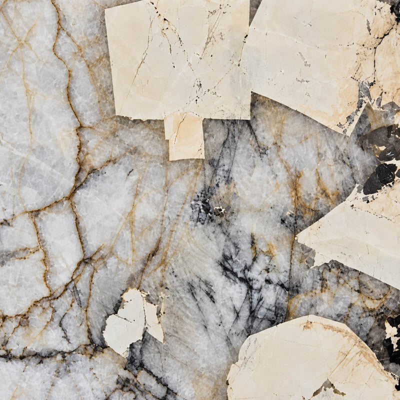 Patagonia 2cm polished granite slab with ivory sections, gray crystalline areas, and black and golden-brown veining.