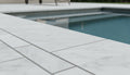 Natural Carrara Equinox Marble Leather (Sandblasted & Brushed) 12 x 24 x 1.25 Bullnose Coping