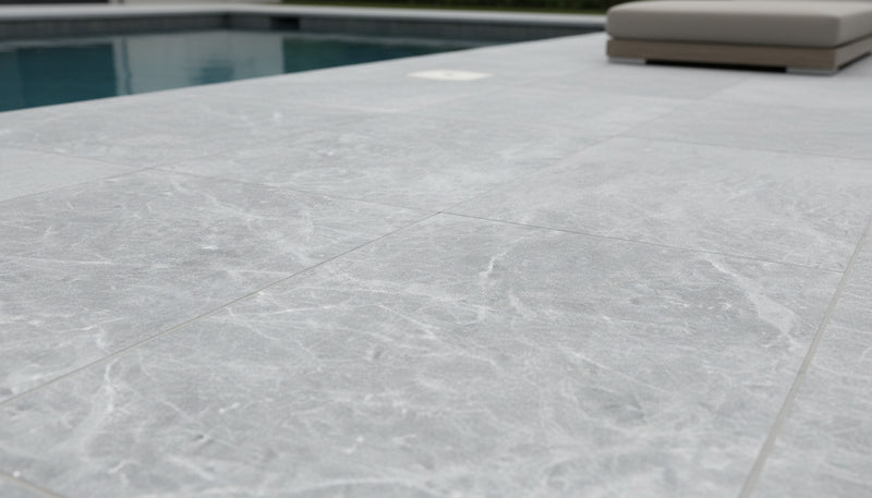 Close-up of Tundra Marble Leather (Sandblasted & Brushed) 16 x 24 x 2 Modern Coping, in Tundra tones.