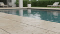 Close-up of Chocolate Brown Walnut Travertine Tumbled 12 x 24 x 2 Modern Coping, in Brown tones.