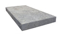 Close-up of Silver Travertine Tumbled 12 x 24 x 2 Modern Coping, in Silver tones.