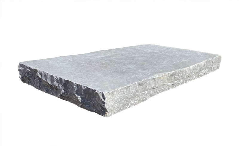 Close-up of Natural Indian Bluestone Limestone Tumbled & Brushed 12 x 24 x 2 Modern Coping, in Natural tones.